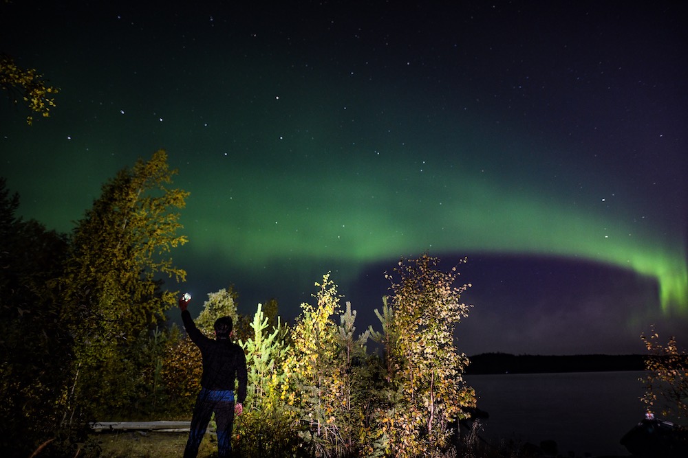 Posing for an aurora shot in Lapland