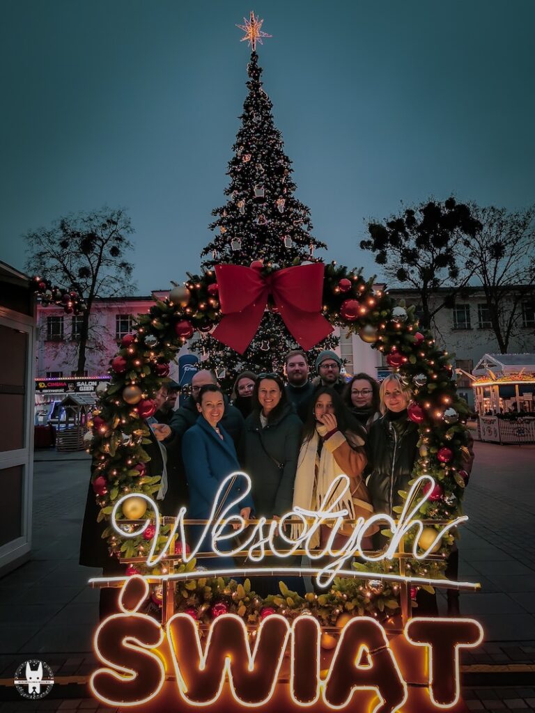 A group picture in Poznan Christmas Market during From Poland With Love organised at Poznań Congress Center