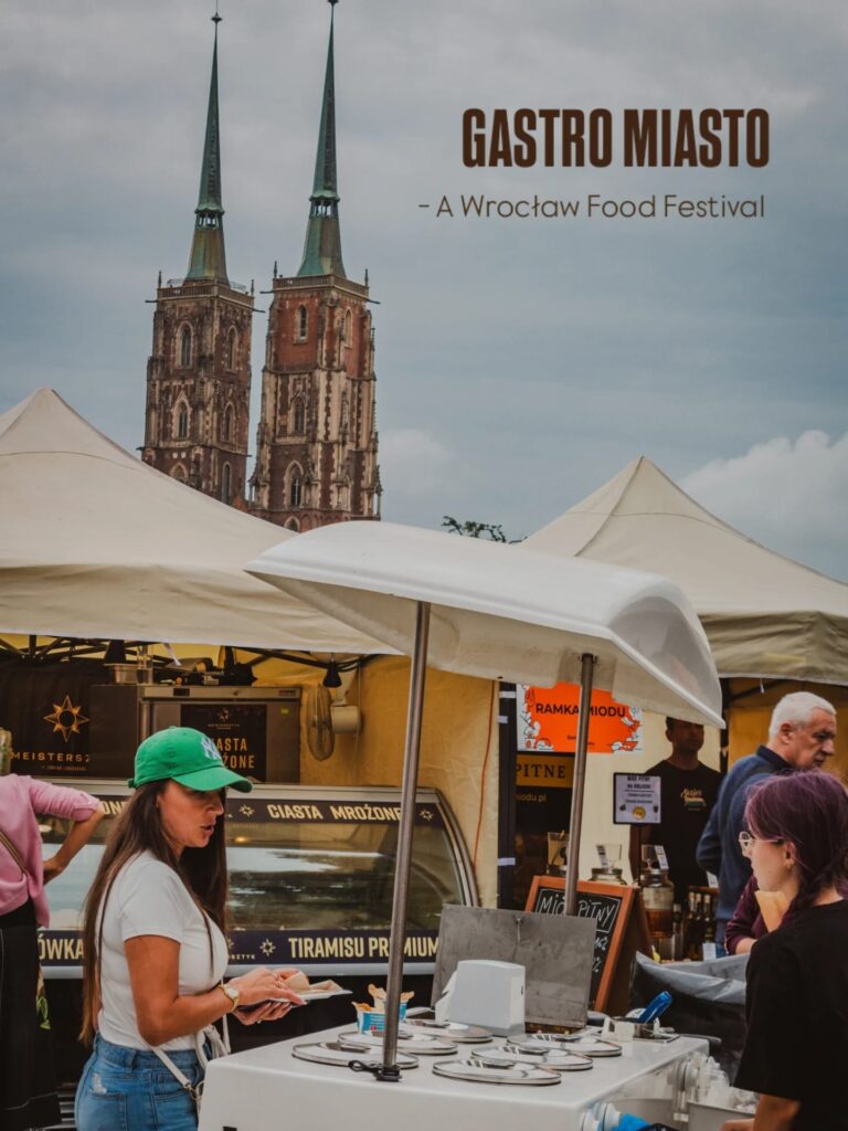 A woman buying ice cream during Gastro Miasto Food Festival in July