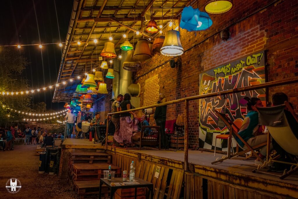 Locals at Nocny Targ, a highlight of summer nightlife in Wrocław