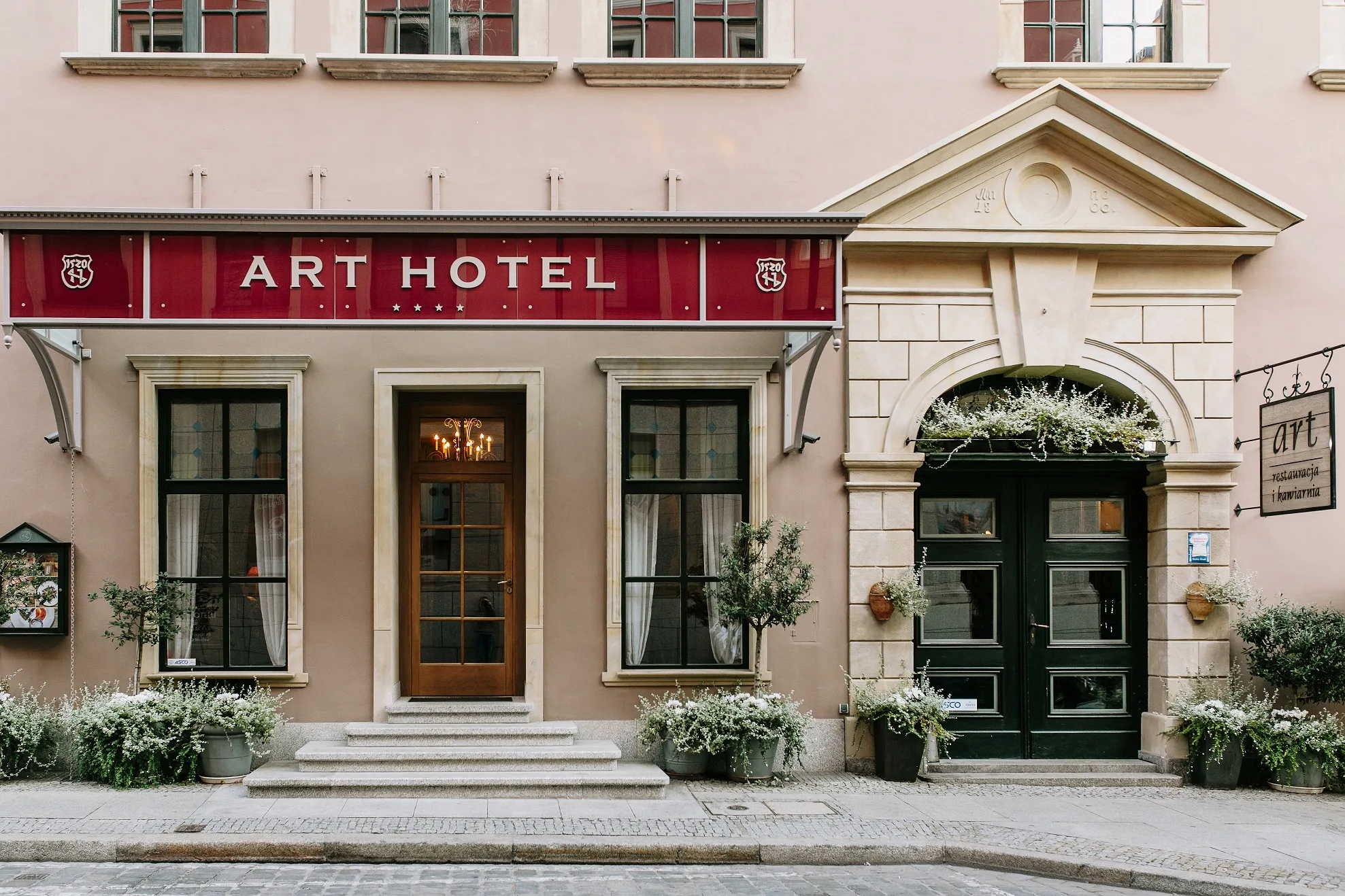Historic entrance of the Art Hotel Wrocław Old Town