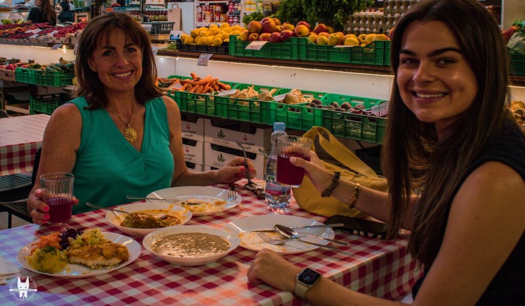British tourists tasting local polish cuisine during Wrocław food tasting tour