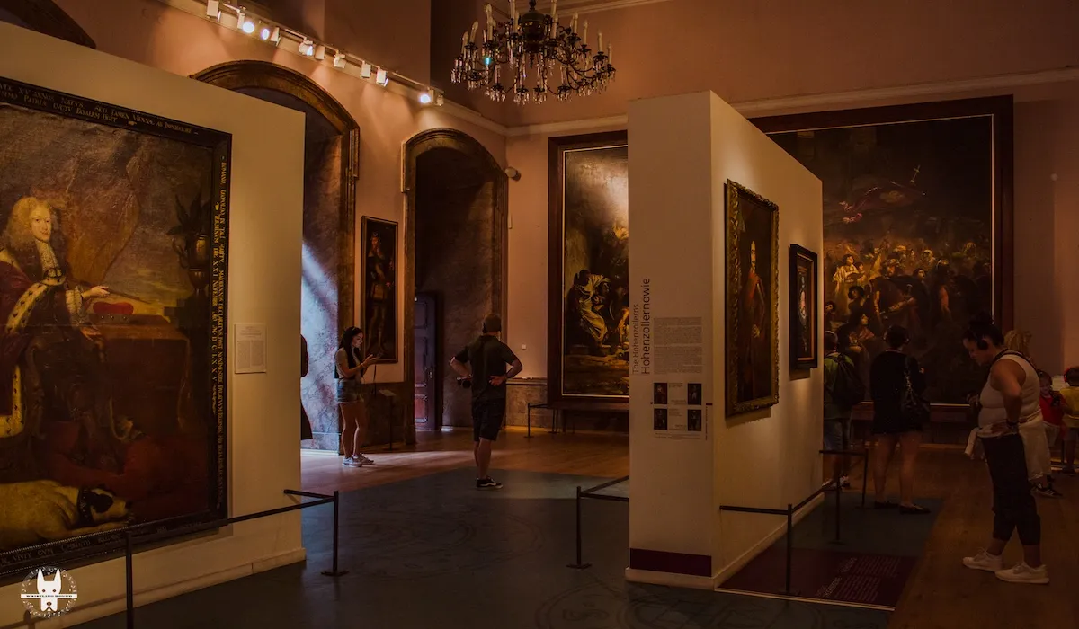 With tourists inside the Ksiaz Castle Museums on day trip from Wrocław