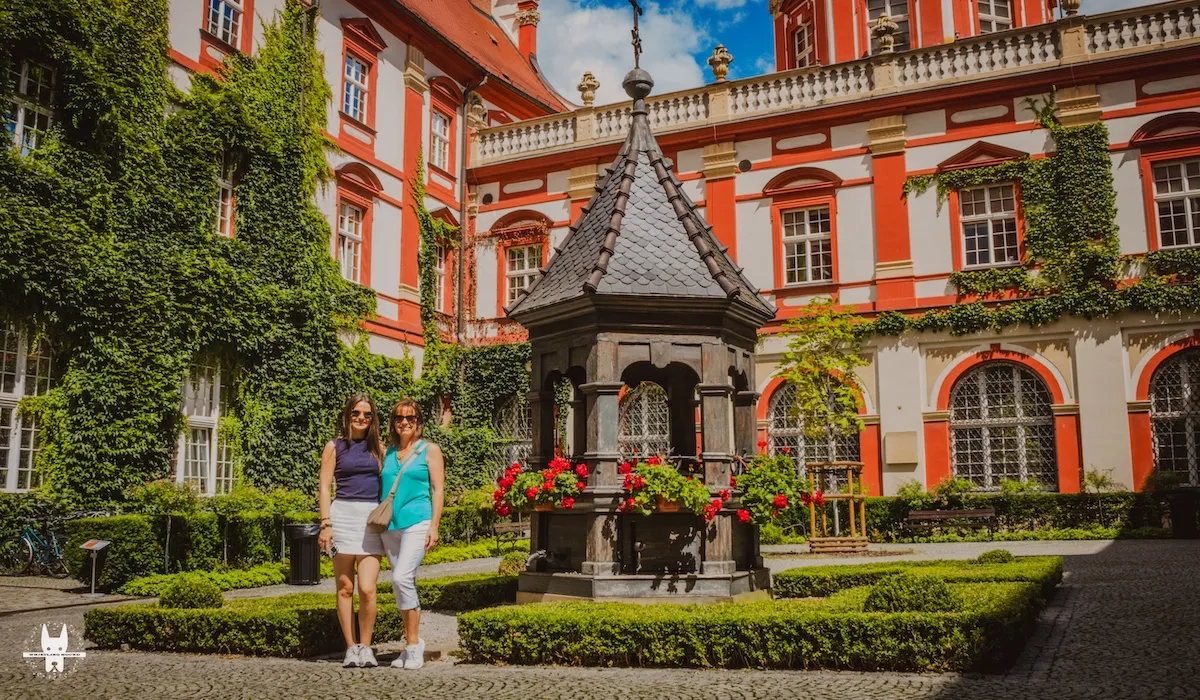 British tourists discovering local hidden gems during Wrocław food tasting and walking tour